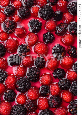 Pie, cheesecake with raspberries and blackberries, mascarpone cheese. Piece of cheesecake 131225261