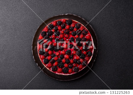 Pie, cheesecake with raspberries and blackberries, mascarpone cheese. Piece of cheesecake Pie, cheesecake with raspberries and blackberries, mascarpone cheese. Piece of cheesecake 131225263