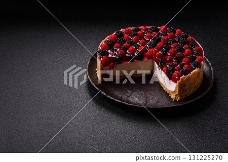 Pie, cheesecake with raspberries and blackberries, mascarpone cheese. Piece of cheesecake Pie, cheesecake with raspberries and blackberries, mascarpone cheese. Piece of cheesecake 131225270