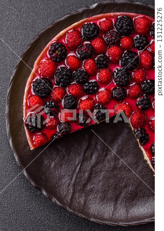 Pie, cheesecake with raspberries and blackberries, mascarpone cheese. Piece of cheesecake Pie, cheesecake with raspberries and blackberries, mascarpone cheese. Piece of cheesecake 131225276