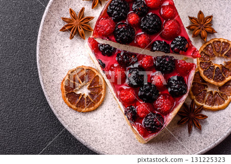 Pie, cheesecake with raspberries and blackberries, mascarpone cheese. Piece of cheesecake Pie, cheesecake with raspberries and blackberries, mascarpone cheese. Piece of cheesecake 131225323