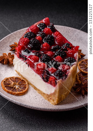 Pie, cheesecake with raspberries and blackberries, mascarpone cheese. Piece of cheesecake Pie, cheesecake with raspberries and blackberries, mascarpone cheese. Piece of cheesecake 131225327