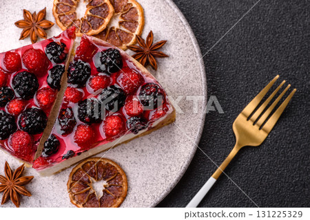 Pie, cheesecake with raspberries and blackberries, mascarpone cheese. Piece of cheesecake Pie, cheesecake with raspberries and blackberries, mascarpone cheese. Piece of cheesecake 131225329
