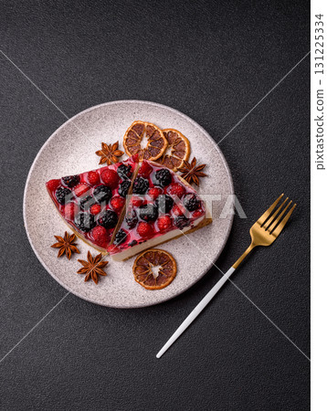Pie, cheesecake with raspberries and blackberries, mascarpone cheese. Piece of cheesecake Pie, cheesecake with raspberries and blackberries, mascarpone cheese. Piece of cheesecake 131225334