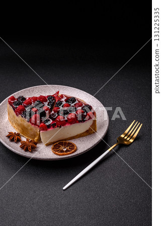 Pie, cheesecake with raspberries and blackberries, mascarpone cheese. Piece of cheesecake Pie, cheesecake with raspberries and blackberries, mascarpone cheese. Piece of cheesecake 131225335