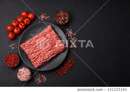 Raw ground beef meat food, ingredient for making cutlets or meatballs. Raw ground beef Raw ground beef meat food, ingredient for making cutlets or meatballs. Raw ground beef 131225345