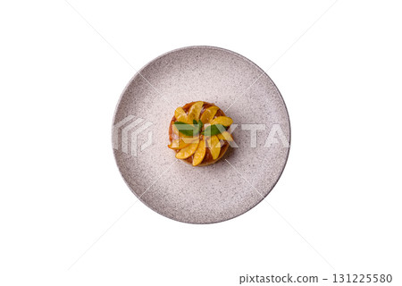 Sweet round pie or tart with apples and peach. Mini sweet tart 131225580