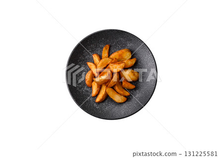 Grilled potato wedges with rosemary, cheese, salt and spices. Baked potato slices Grilled potato wedges with rosemary, cheese, salt and spices. Baked potato slices 131225581