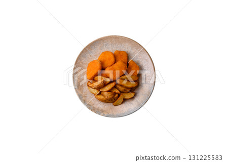 Crispy chicken nuggets, meat takeaway meal with salt. Chicken nuggets, fast food Crispy chicken nuggets, meat takeaway meal with salt. Chicken nuggets, fast food 131225583