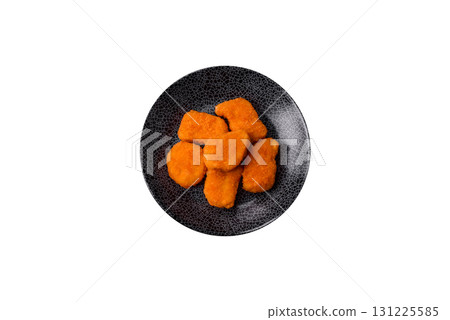Crispy chicken nuggets, meat takeaway meal with salt. Chicken nuggets, fast food 131225585