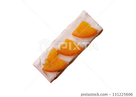 Nougat or white caramel with hazelnuts and pistachios and citrus pieces. White nougat with nuts Nougat or white caramel with hazelnuts and pistachios and citrus pieces. White nougat with nuts 131225606