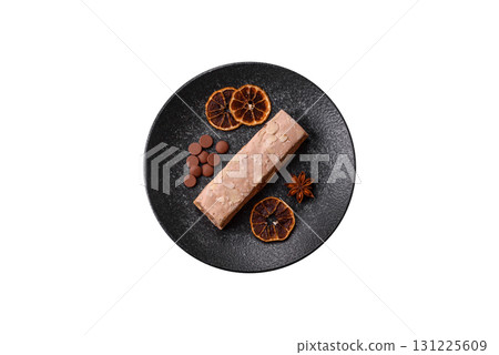 Nougat or white caramel with hazelnuts and pistachios and citrus pieces. White nougat with nuts Nougat or white caramel with hazelnuts and pistachios and citrus pieces. White nougat with nuts 131225609