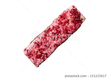 Nougat or white caramel with hazelnuts and strawberry pieces. White nougat Nougat or white caramel with hazelnuts and strawberry pieces. White nougat 131225617