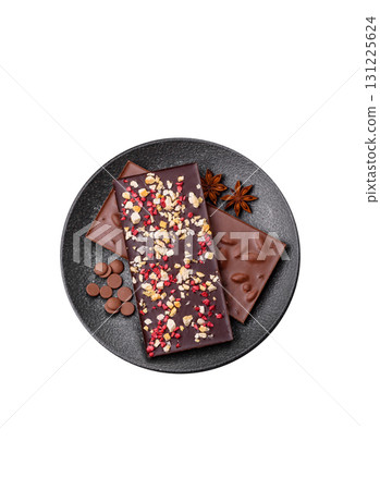 Bar sweet craft artisan chocolate with dried fruits made at home. Craft chocolate 131225624
