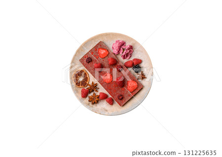 Bar sweet craft artisan chocolate with dried fruits made at home. Craft chocolate 131225635