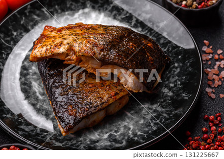 Food, seafood, grilled fish fillet with lemon, salt and spices. Grilled fish fillet Food, seafood, grilled fish fillet with lemon, salt and spices. Grilled fish fillet 131225667