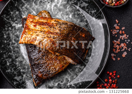Food, seafood, grilled fish fillet with lemon, salt and spices. Grilled fish fillet 131225668