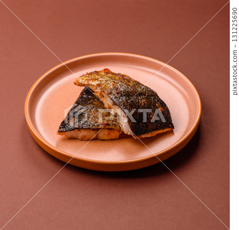 Food, seafood, grilled fish fillet with lemon, salt and spices. Grilled fish fillet Food, seafood, grilled fish fillet with lemon, salt and spices. Grilled fish fillet 131225690