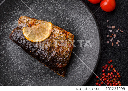 Food, seafood, grilled fish fillet with lemon, salt and spices. Grilled fish fillet 131225699