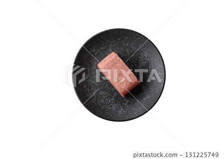 Food, meat, ham sliced in slices for the festive table. Spiced ham 131225749