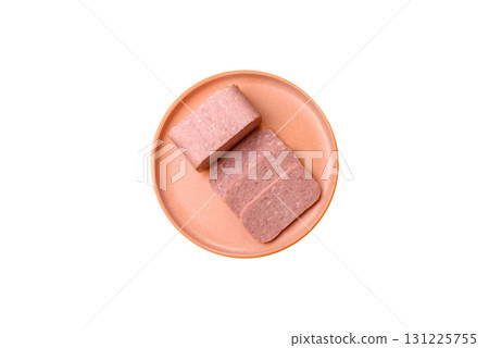 Food, meat, ham sliced in slices for the festive table. Spiced ham 131225755