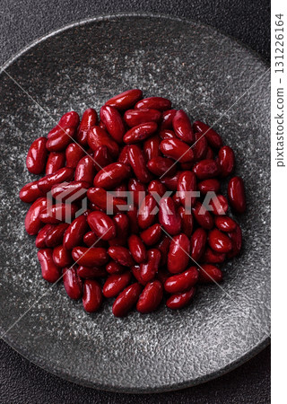 Red beans canned as an ingredient for cooking healthy or vegetarian food. Canned beans Red beans canned as an ingredient for cooking healthy or vegetarian food. Canned beans 131226164
