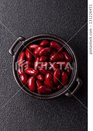 Red beans canned as an ingredient for cooking healthy or vegetarian food. Canned beans 131226451