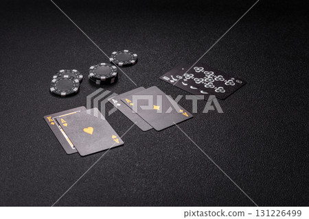 Playing blackjack or baccarat card game in casino with chips, bets and risk. Cards and chips 131226499