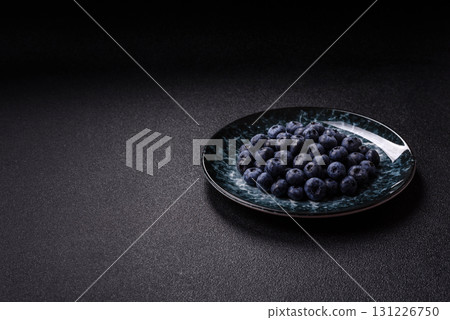 Fresh juicy blueberries, healthy vegan food with vitamins and minerals. Blueberries berry 131226750