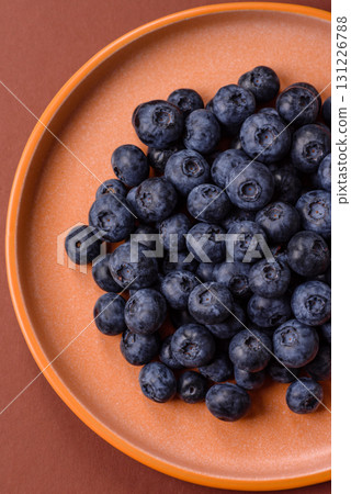 Fresh juicy blueberries, healthy vegan food with vitamins and minerals. Blueberries berry Fresh juicy blueberries, healthy vegan food with vitamins and minerals. Blueberries berry 131226788