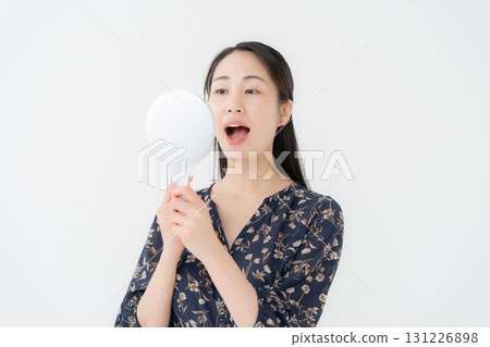 Woman looking in the mirror dental Woman looking in the mirror dental 131226898