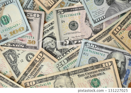 Stack of dollar bills. Hundred, fifty, twenty, ten, five dollars banknote close up 131227025