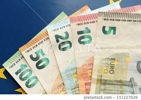European union money currency Euro different paper notes on flag 131227026