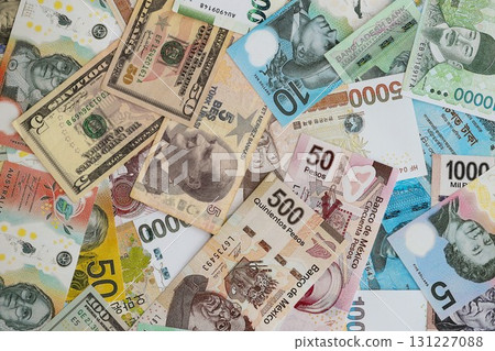 Big amount of money bills of different currencies and countries. Assortment background 131227088