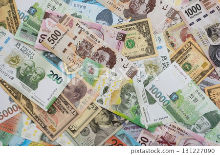 Big amount of money bills of different currencies and countries. Assortment background Big amount of money bills of different currencies and countries. Assortment background 131227090