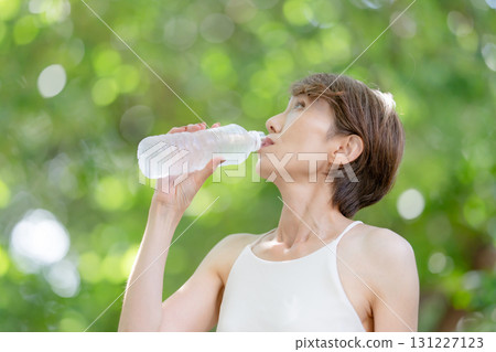 Woman outdoors in water Woman outdoors in water 131227123