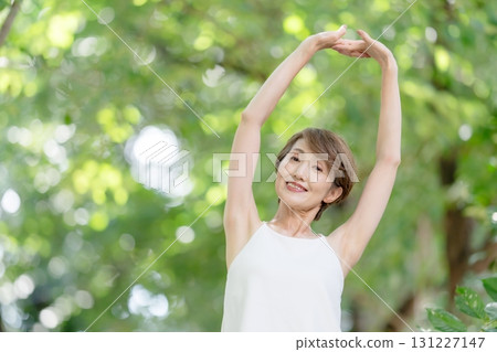 Yoga woman outdoors 131227147