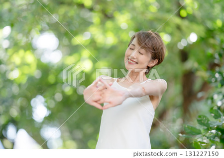 Yoga woman outdoors 131227150