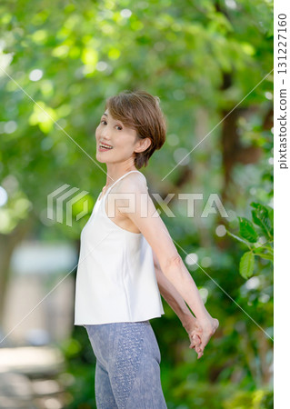 Yoga woman outdoors 131227160