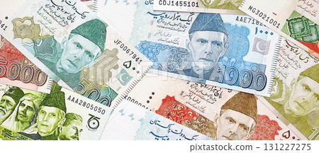 Pakistan rupees banknotes. The current Pakistan money bills lies on table in big amount 131227275
