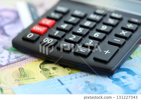 Thai baht currency money bills and calculator. The concept of taxation and money count 131227343