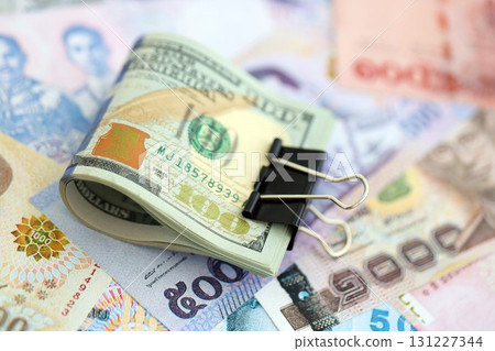 Thai baht currency money bills and bunch of us dollars. The concept of currency exchange 131227344