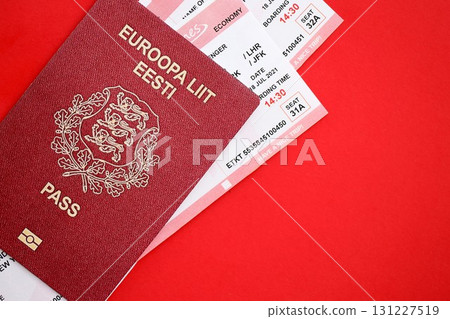 Estonia passport and airlines boarding pass tickets. Travel flights and avia tourism in Europe Estonia passport and airlines boarding pass tickets. Travel flights and avia tourism in Europe 131227519