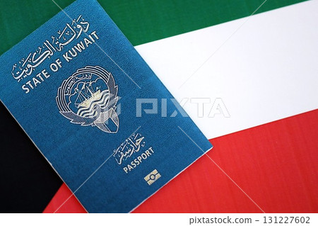 Kuwaiti passport on flag. The concept of citizenship 131227602