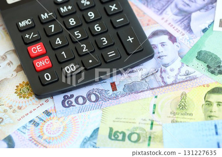 Thai baht currency money bills and calculator. The concept of taxation and money count 131227635