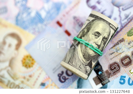 Thai baht currency money bills and bunch of us dollars. The concept of currency exchange 131227648