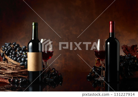 Red wine with blue grapes on a brown background. Red wine with blue grapes on a brown background. 131227914