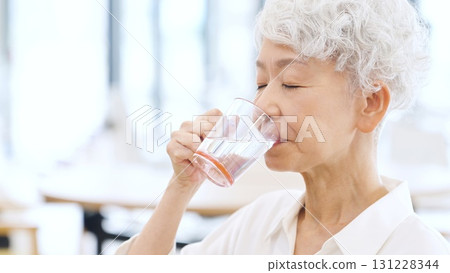 Asian elderly people drinking water 131228344