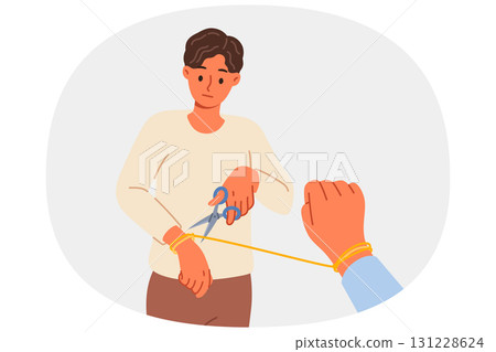 Man breaking up with woman and cuts rope on hand, due to lack of love after betrayal 131228624