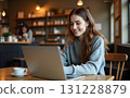 beautiful young female sitting and working in coffee shop with her business lifestyle working  131228879